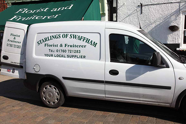 Florist and Fruiterer delivery van outside shop